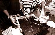 Children conducting stream experiment
